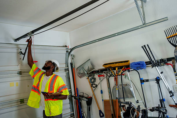 Professional Garage Door Panel Replacement technician working in The Pinehills, MA